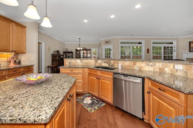 133 Mill Park Ln, Madison, AL 35758 - kitchen featuring wood finished floors, dishwasher, a sink, and a kitchen island