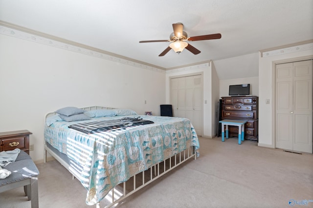 carpeted bedroom featuring ceiling fan