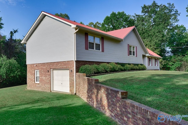 view of property exterior featuring a lawn and a garage