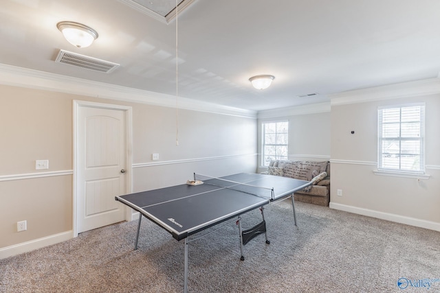 rec room with crown molding and carpet floors