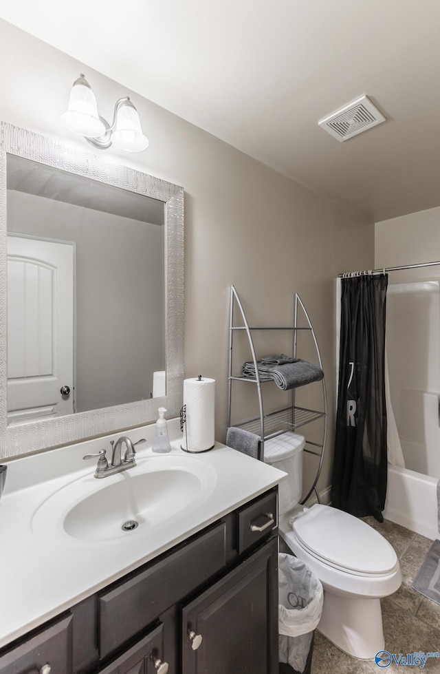 full bathroom featuring vanity, shower / tub combo, and toilet