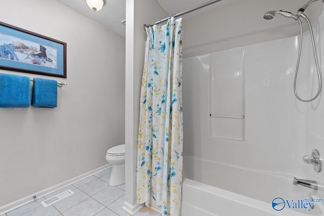 bathroom with toilet, baseboards, visible vents, shower / tub combo, and tile patterned flooring