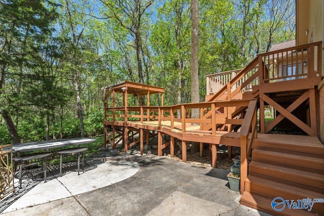 exterior space featuring stairs and a deck