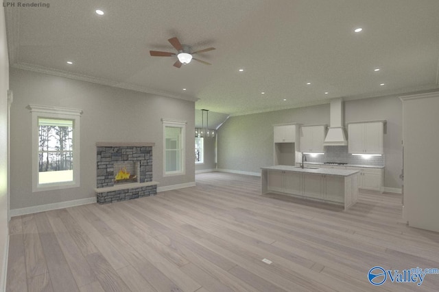 HIGHPOINTB2 Mallard Dr, Madison, AL 35756 - unfurnished living room featuring recessed lighting, ceiling fan, light wood finished floors, a fireplace, and crown molding