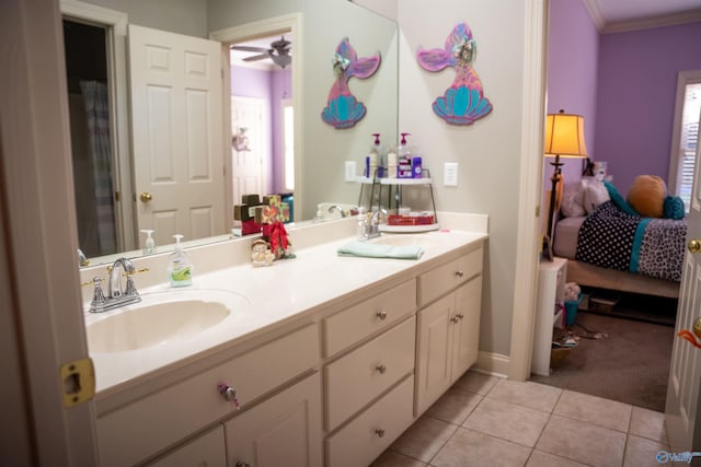 bathroom featuring ceiling fan, vanity, tile patterned flooring, and ornamental molding