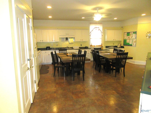 dining area with ceiling fan