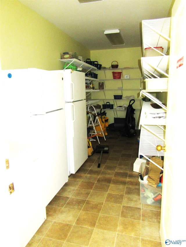 interior space featuring white cabinetry