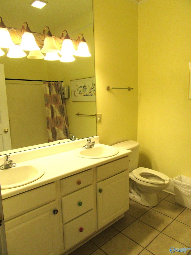 bathroom with tile patterned flooring, vanity, toilet, and a shower with shower curtain