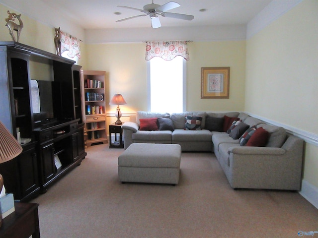 carpeted living room featuring ceiling fan