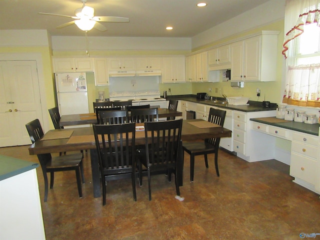 kitchen with white cabinetry, sink, ceiling fan, and white appliances