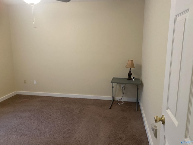 spare room featuring carpet