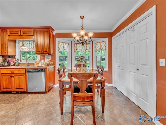 dining area with a chandelier, crown molding, light tile patterned flooring, and baseboards