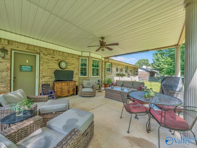 view of patio / terrace with outdoor lounge area and a ceiling fan