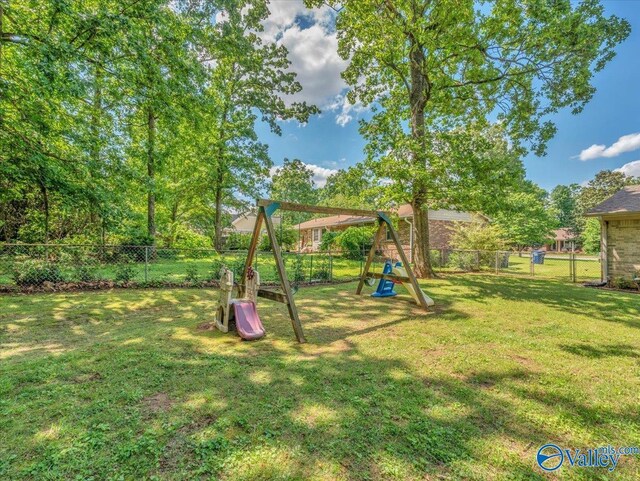 view of yard with a playground