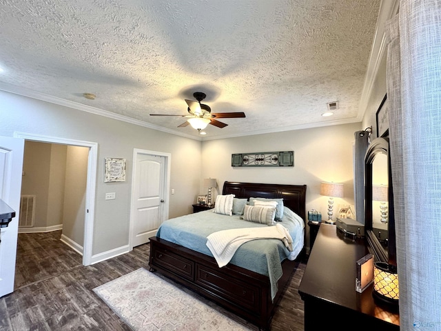 bedroom with dark hardwood / wood-style flooring, a textured ceiling, ornamental molding, and ceiling fan