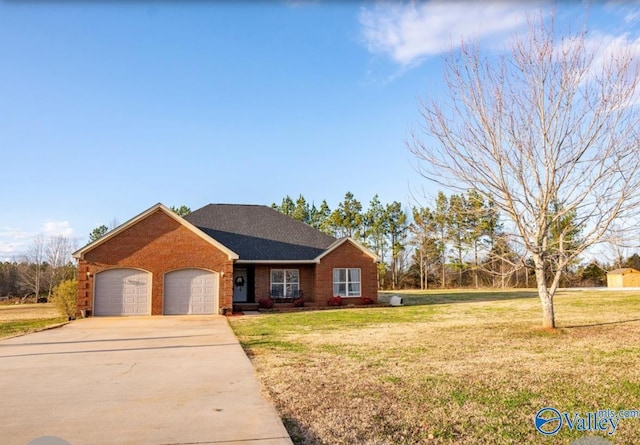 single story home featuring a garage and a front yard