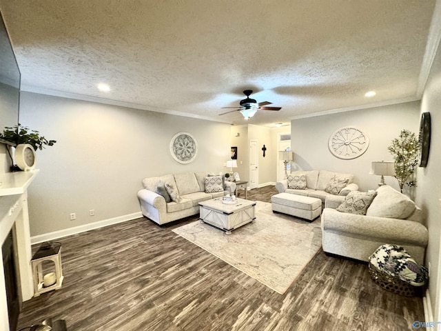 living room with ceiling fan, crown molding, dark wood-type flooring, and a textured ceiling