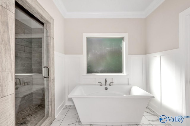 bathroom with ornamental molding and independent shower and bath