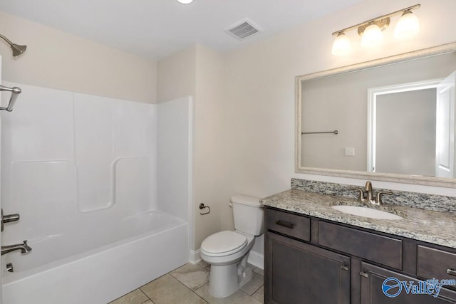 full bathroom with toilet, vanity, tile patterned flooring, and bathing tub / shower combination