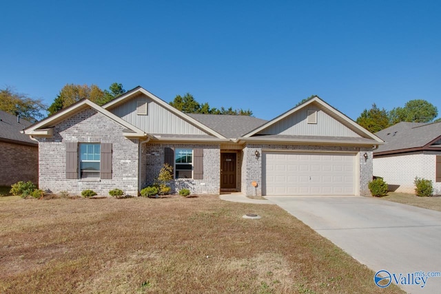 craftsman house with a front lawn and a garage