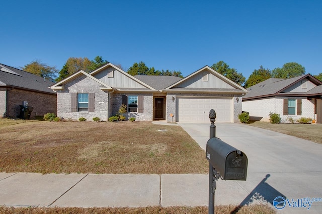 view of front facade with a garage and a front yard