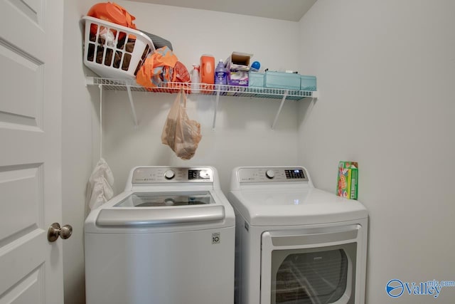 laundry room featuring independent washer and dryer