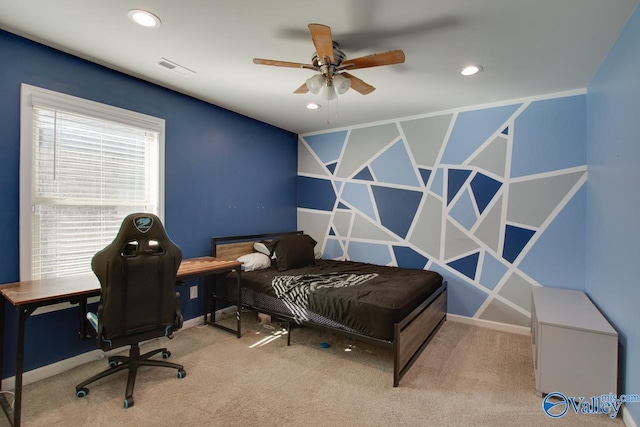 bedroom featuring ceiling fan and light colored carpet