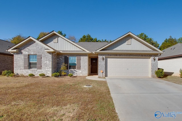 craftsman-style house featuring a garage and a front lawn