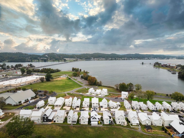aerial view with a residential view and a water view