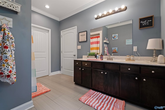 bathroom featuring vanity, ornamental molding, and walk in shower