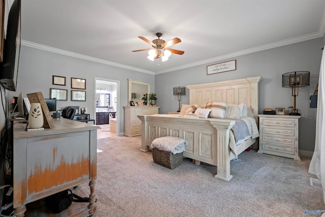 bedroom featuring ceiling fan, light colored carpet, ornamental molding, and connected bathroom