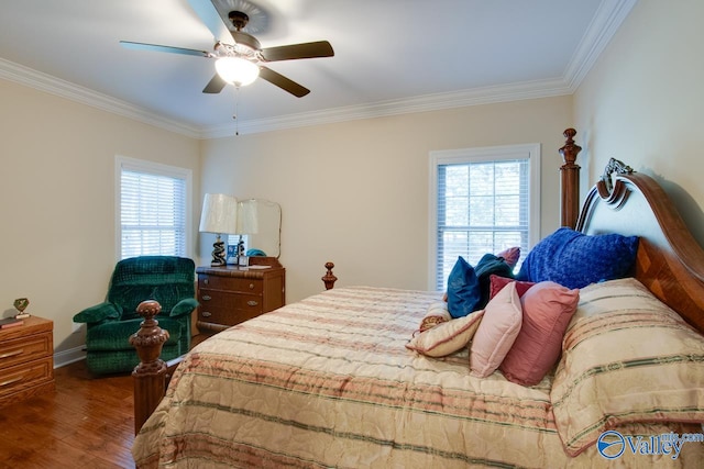 bedroom with crown molding, multiple windows, hardwood / wood-style flooring, and ceiling fan