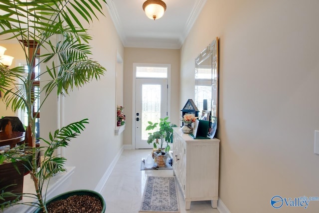 entryway featuring crown molding