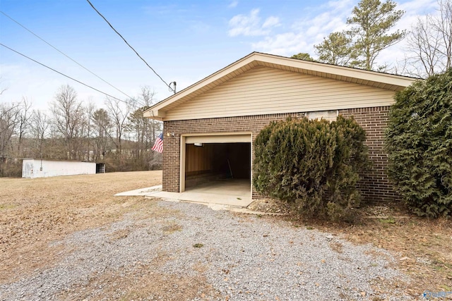 view of home's exterior with a garage