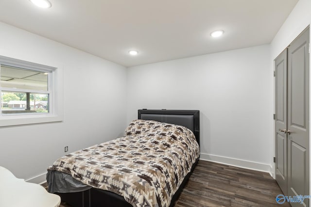 bedroom featuring a closet and hardwood / wood-style flooring