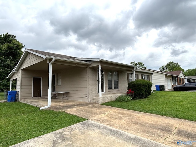 1300 7th Ave, Athens, AL 35611 - single story home featuring a front yard and brick siding
