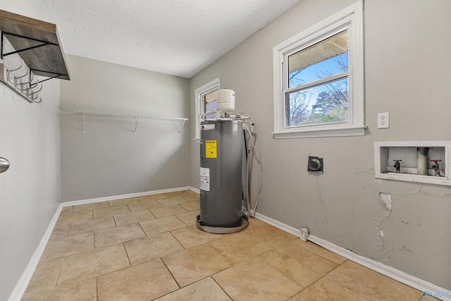 utility room featuring water heater