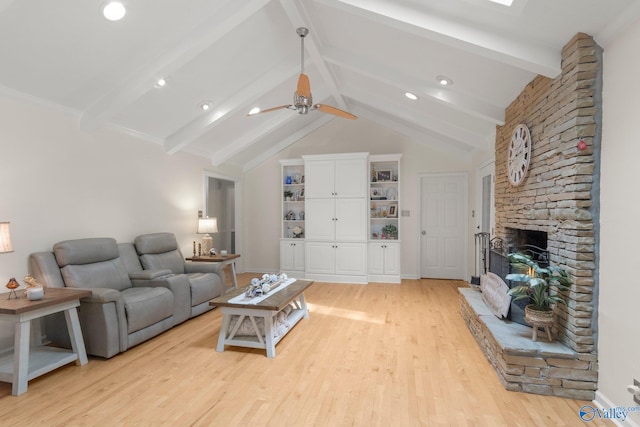 living room featuring recessed lighting, a fireplace, light wood-style floors, vaulted ceiling with beams, and a ceiling fan