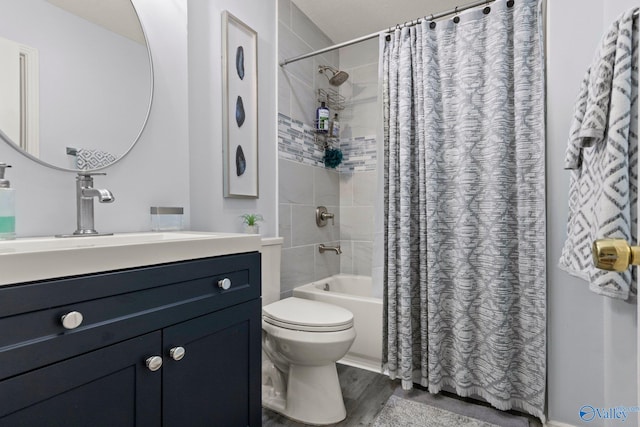 bathroom with wood finished floors, shower / tub combo with curtain, toilet, and vanity