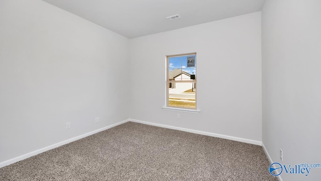 unfurnished room with carpet floors