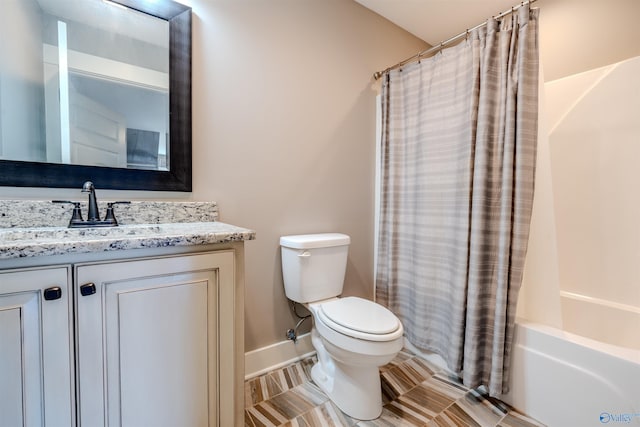 full bathroom with toilet, shower / bath combo, and vanity