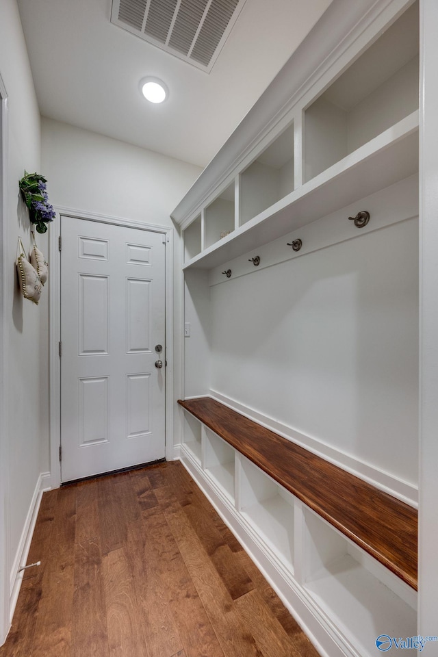 mudroom with wood-type flooring