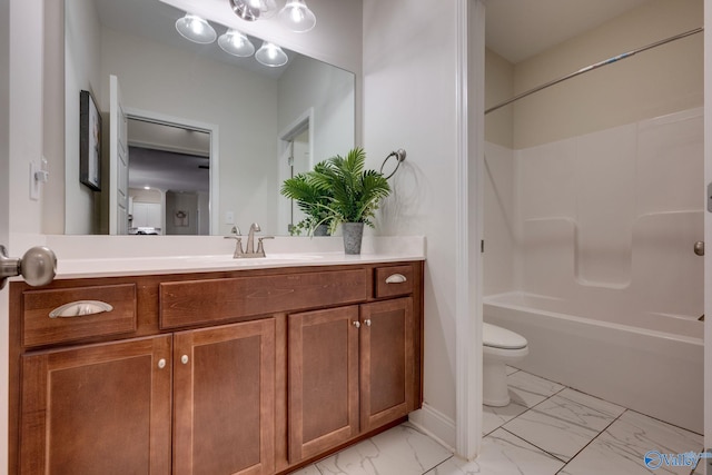 full bathroom featuring vanity, shower / washtub combination, and toilet