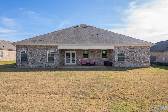 back of property featuring a lawn, french doors, and central air condition unit