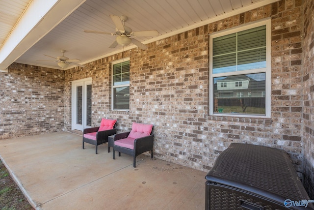 view of patio / terrace featuring ceiling fan