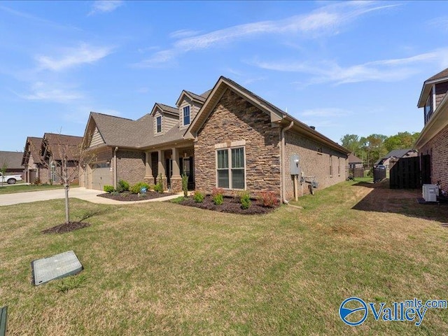 414 Wood Sage Ln, Huntsville, AL 35824 - view of front of property with a garage, fence, concrete driveway, and a front lawn
