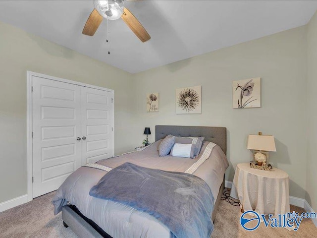 414 Wood Sage Ln, Huntsville, AL 35824 - carpeted bedroom featuring a closet, baseboards, and ceiling fan
