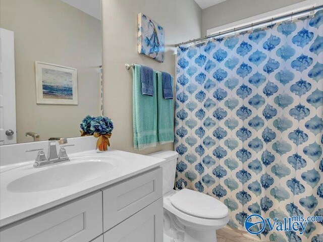 414 Wood Sage Ln, Huntsville, AL 35824 - full bath with toilet, curtained shower, and vanity