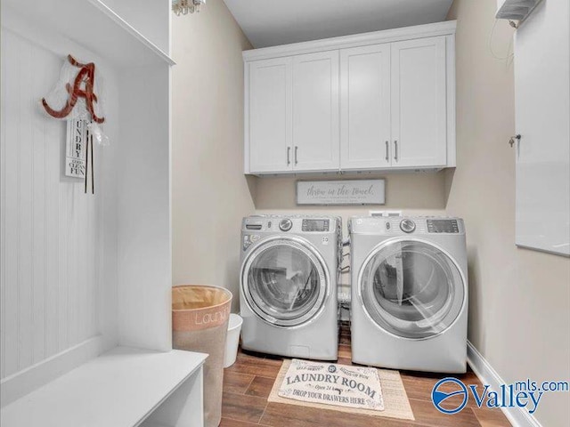 414 Wood Sage Ln, Huntsville, AL 35824 - washroom with independent washer and dryer, wood finished floors, baseboards, and cabinet space