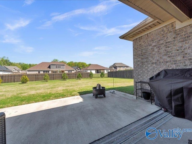 414 Wood Sage Ln, Huntsville, AL 35824 - view of patio / terrace featuring an outdoor fire pit, a fenced backyard, and a grill